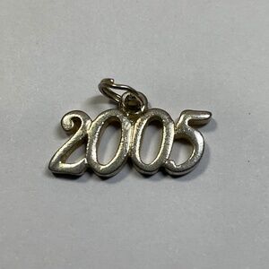 Sterling Silver 2005 Pendant. 3/4 inches wide